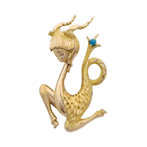 Broche vintage "Capricorne", or jaune, turquoise.