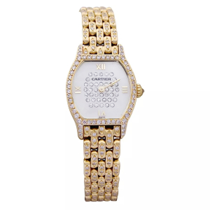 Montre Cartier "Tortue" or jaune, diamants, nacre.