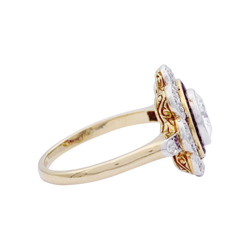 A Diamond, calibrated rubies gold and platinum antique ring.