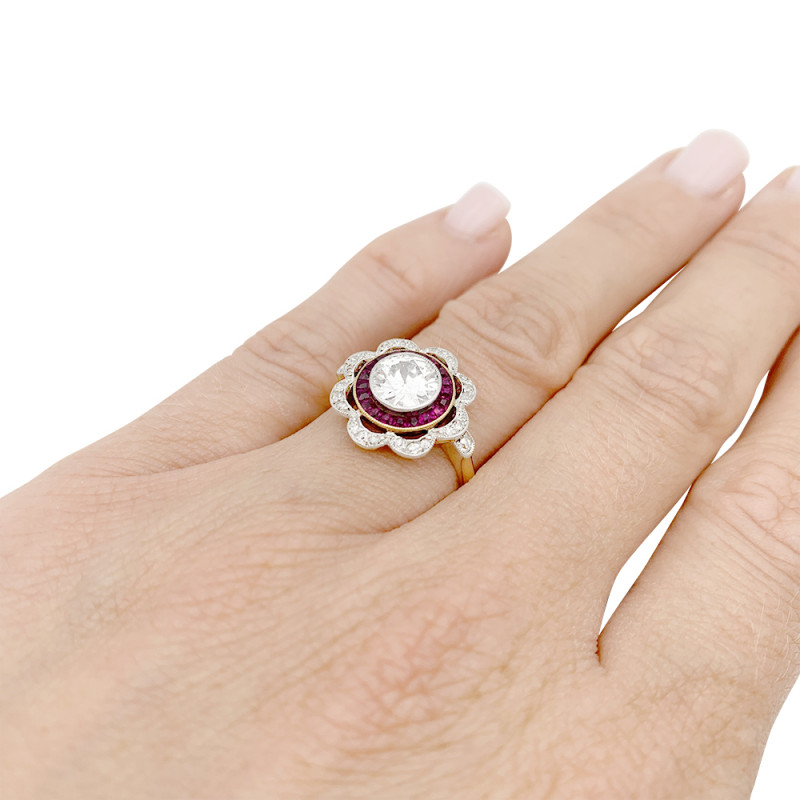 A Diamond, calibrated rubies gold and platinum antique ring.
