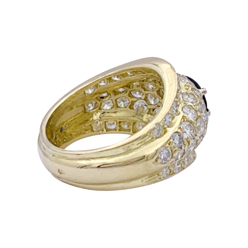 Bague or jaune, diamants et saphir.