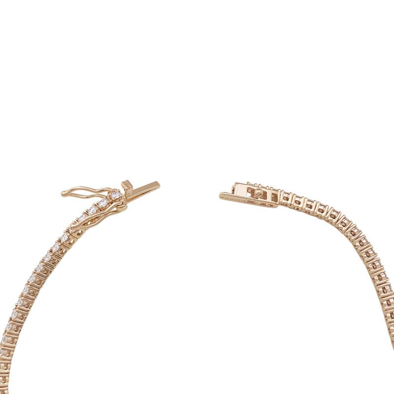 Tennis bracelet gold, diamonds.