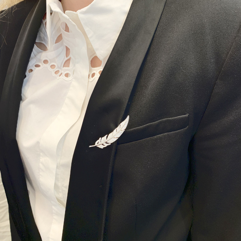 Boucheron white gold and diamonds "Feather" brooch.