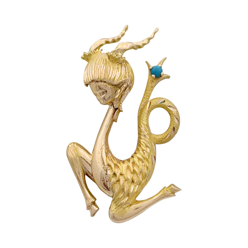 Vintage gold, turquoise "Capricorn" brooch.