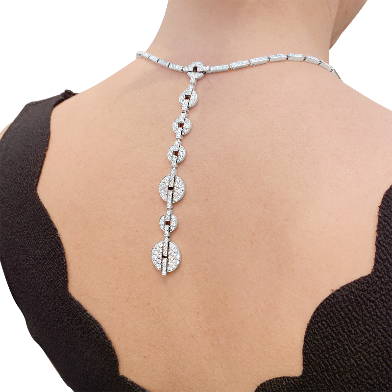 Collier Haute Joaillerie Cartier "Himalia" or blanc, diamants.