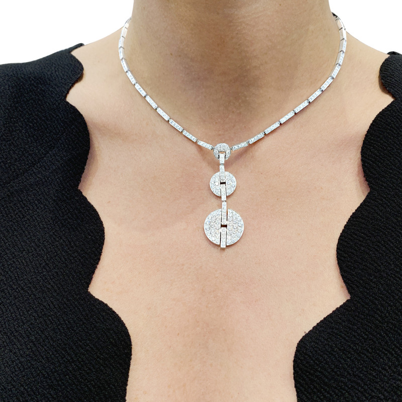 Collier Haute Joaillerie Cartier "Himalia" or blanc, diamants.
