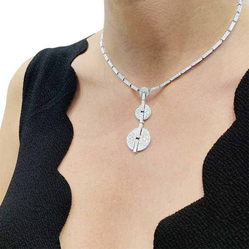 Collier Haute Joaillerie Cartier "Himalia" or blanc, diamants.