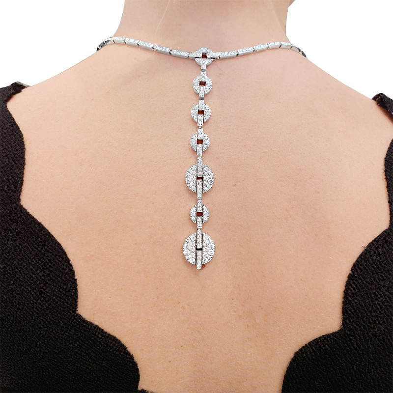 Collier Haute Joaillerie Cartier "Himalia" or blanc, diamants.