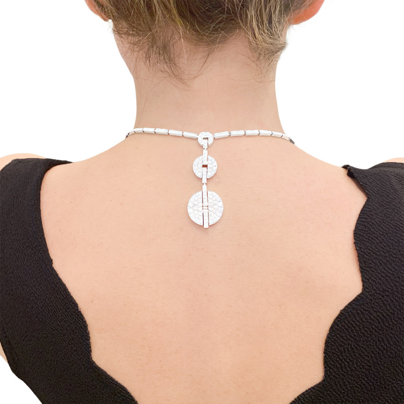 Collier Haute Joaillerie Cartier "Himalia" or blanc, diamants.