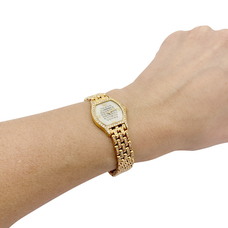 Montre Cartier "Tortue" or jaune, diamants, nacre.