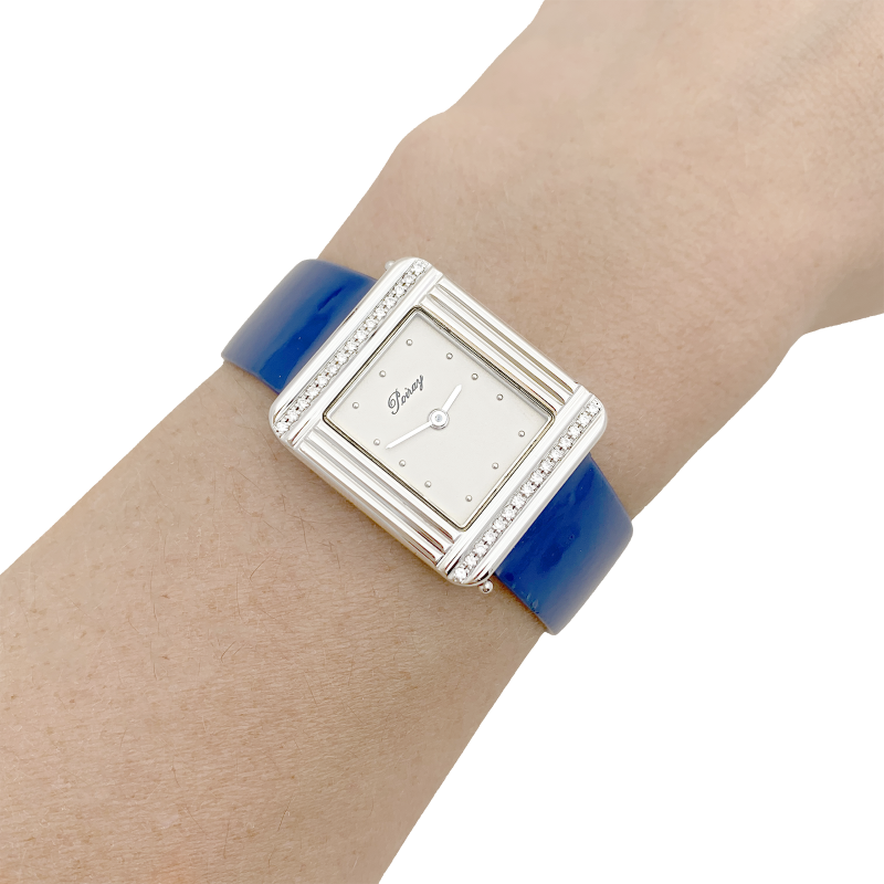 Poiray steel and diamonds watch, "Ma première" collection.