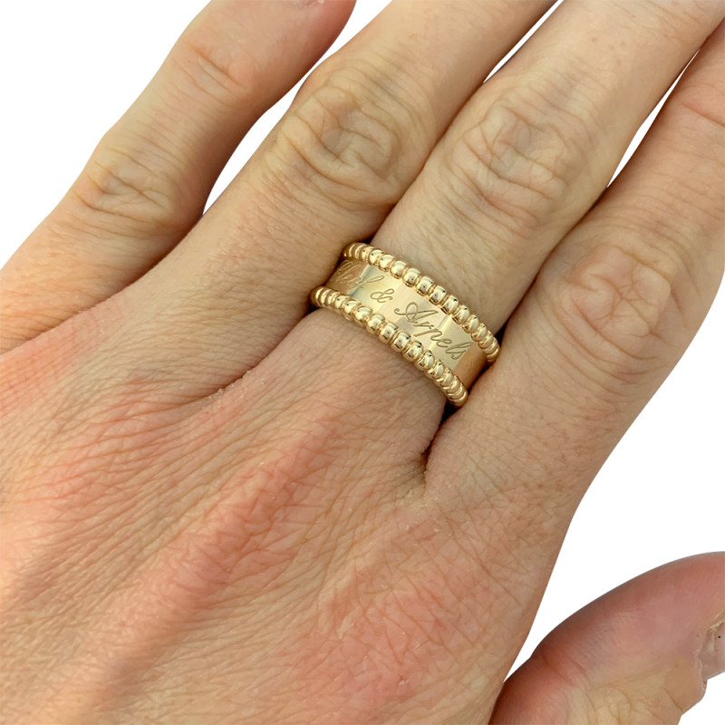 Van Cleef & Arpels gold ring, "Perlée signature" collection.