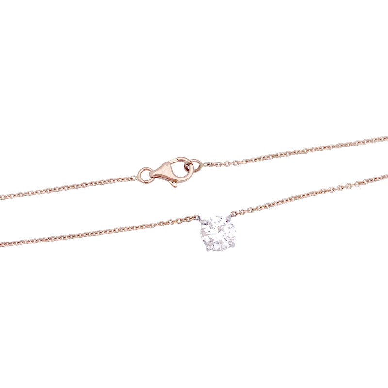 Gold and diamond solitaire necklace.
