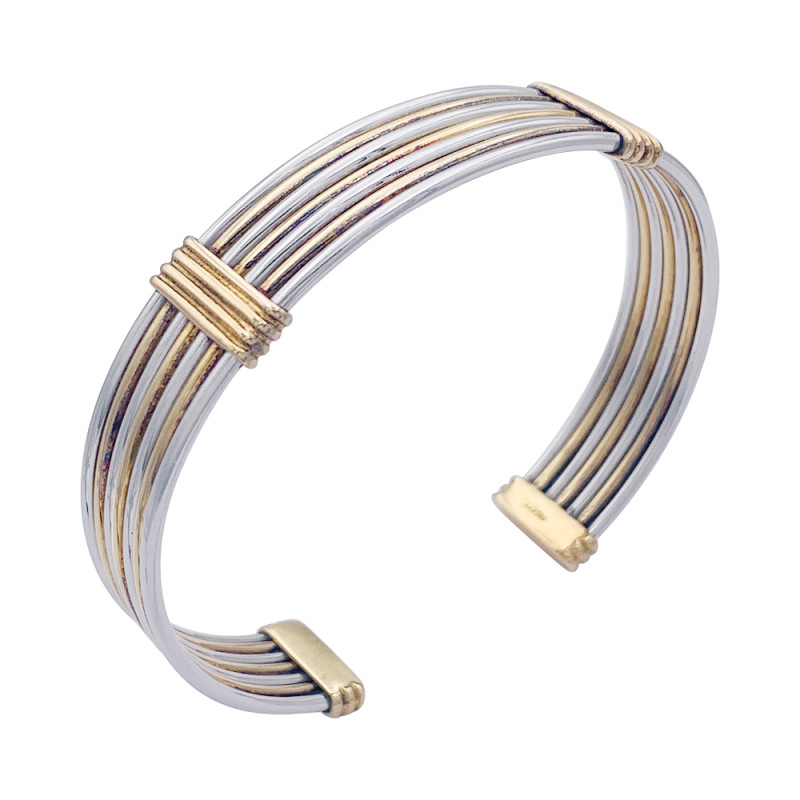 Bracelet Cartier or jaune et acier.