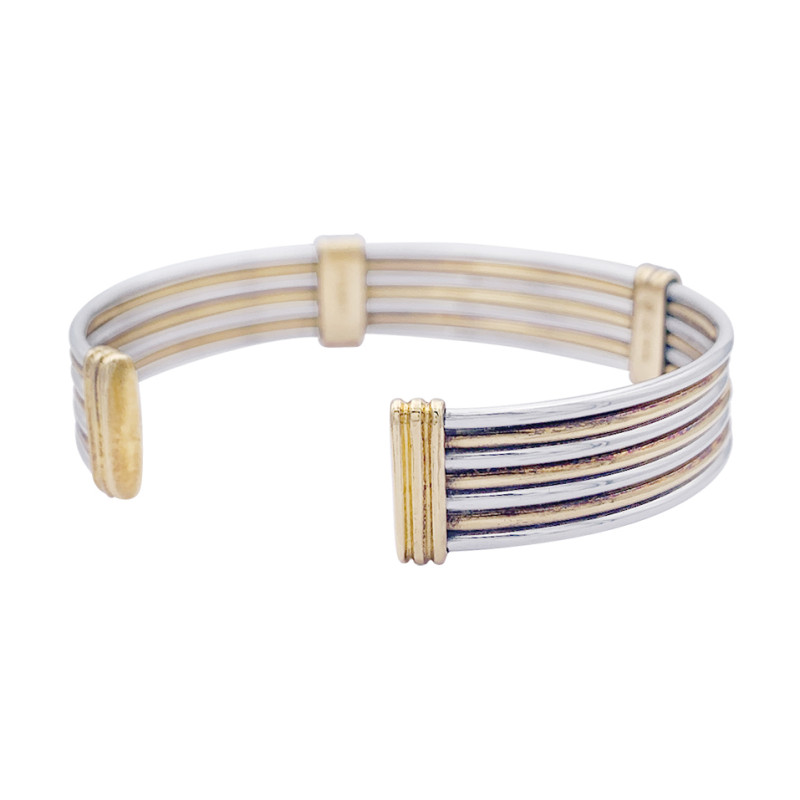 Bracelet Cartier or jaune et acier.