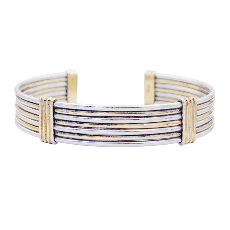 Bracelet Cartier or jaune et acier.