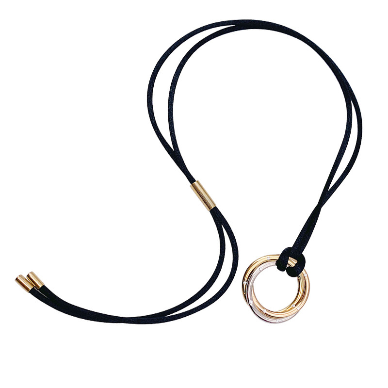 Collier Cartier, "Trinity", trois ors, diamants.