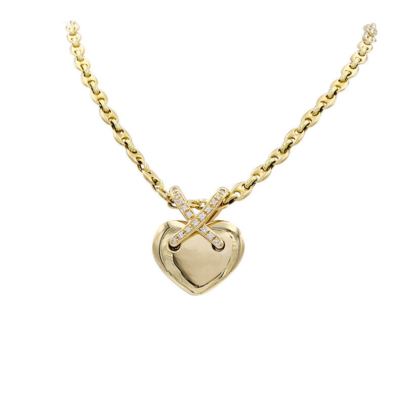Pendentif Chaumet, collection "Liens", en or jaune et diamants.