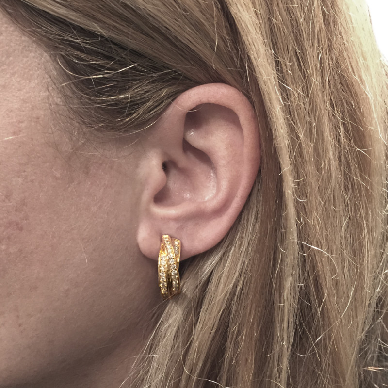 Yellow gold Cartier "Trinity" earrings, diamonds.