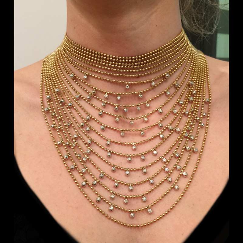 Collier Cartier "Draperie" en or jaune, or blanc et diamants.