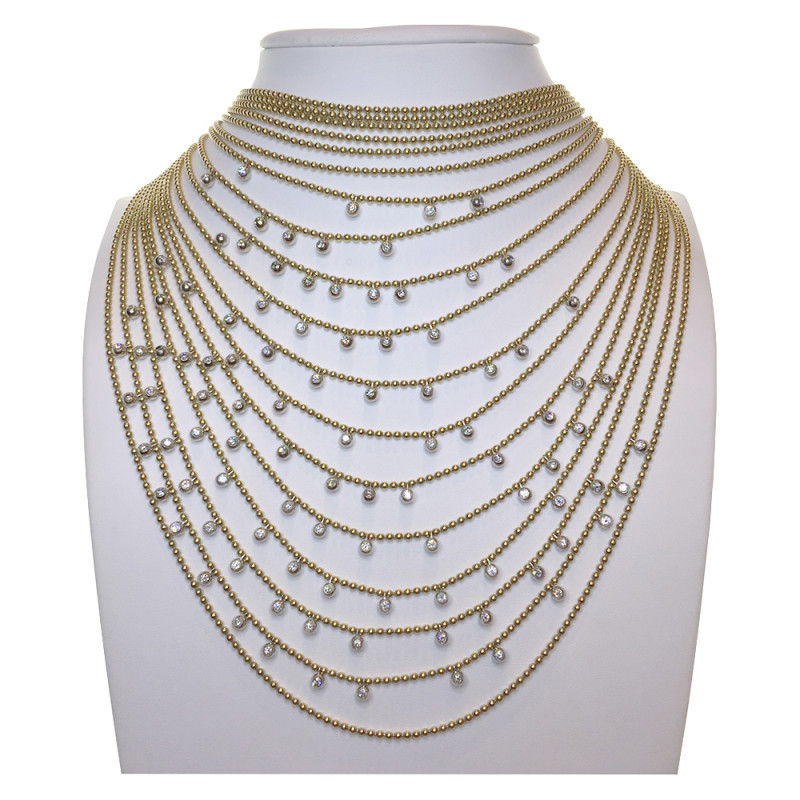 Collier Cartier "Draperie" en or jaune, or blanc et diamants.