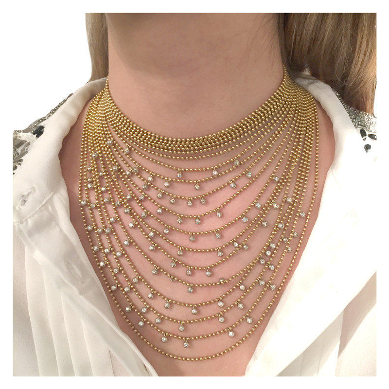 Collier Cartier "Draperie" en or jaune, or blanc et diamants.