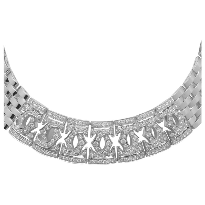 Collier ras de cou Cartier double "C" en or blanc, diamants.