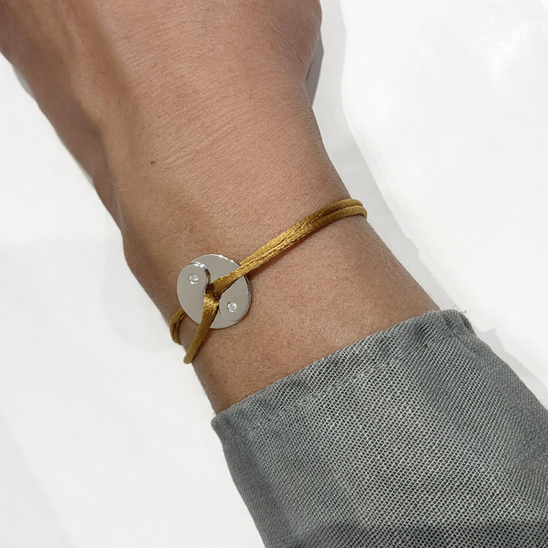 Motif Dinh Van modèle "Double-sens" en or blanc, diamants.