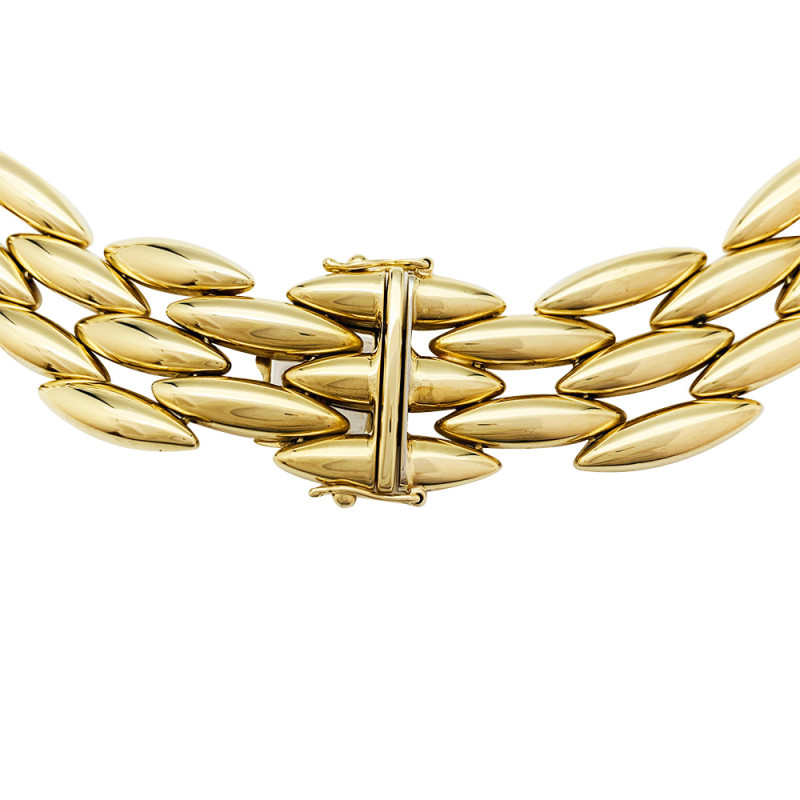 Collier Cartier "Gentiane" en or jaune.