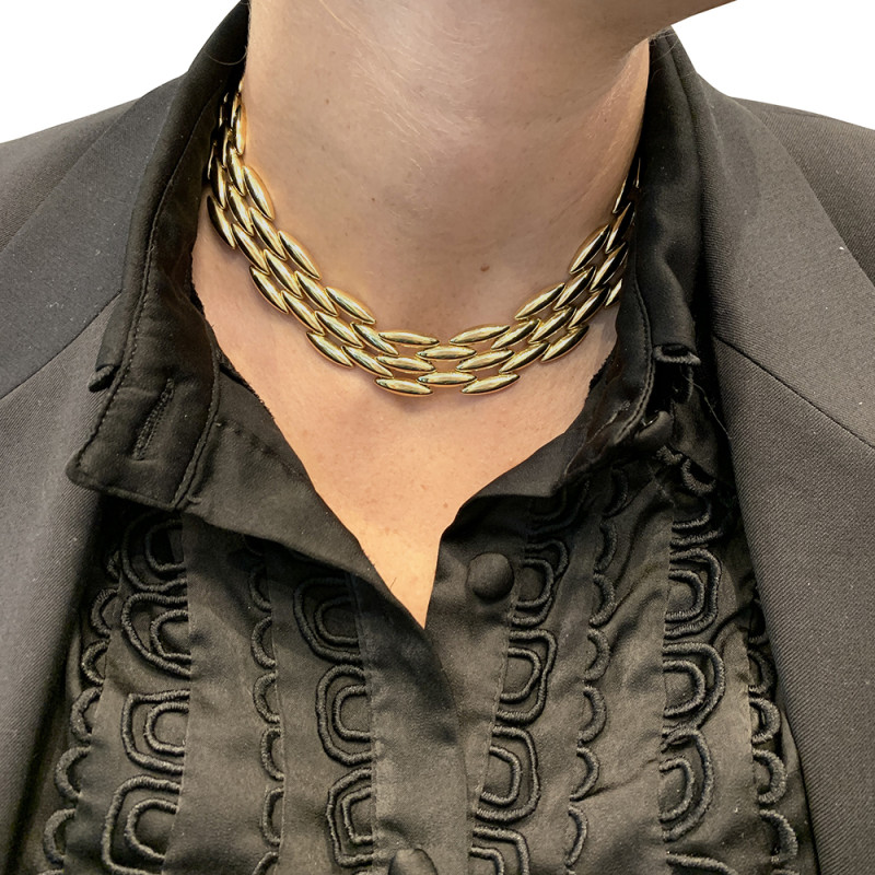 Collier Cartier "Gentiane" en or jaune.