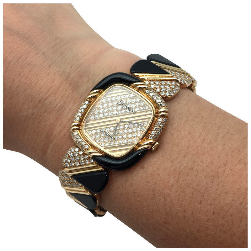 Yellow gold Chaumet, DeLaneau watch, diamonds and onyx.