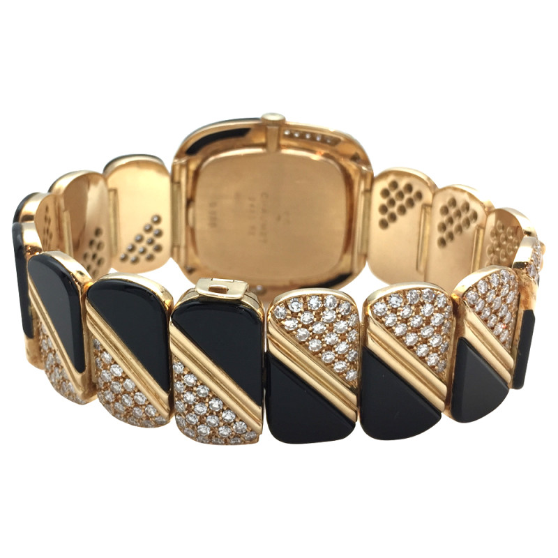 Yellow gold Chaumet, DeLaneau watch, diamonds and onyx.