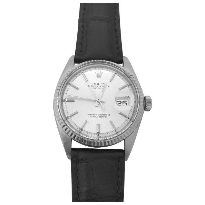 Montre Rolex modèle "Datejust" en acier, lunette en or blanc, sur cuir.